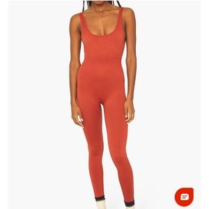 We Wore What ribbed jumpsuit in rust